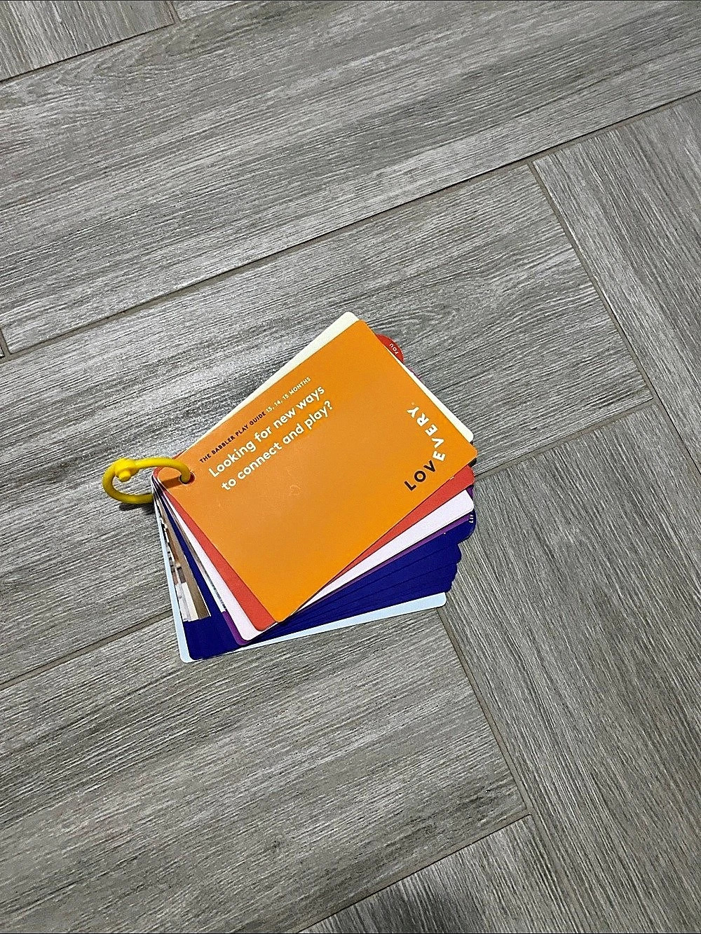 Lovevery The Babbler Play Guide (Months 13, 14, 15) Orange & Blue
